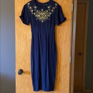 Dark blue dress with good embroidery.